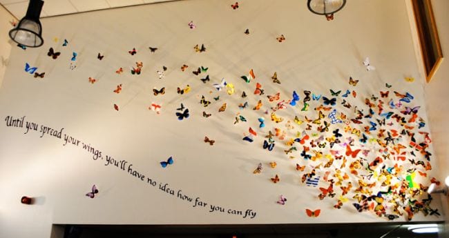 School Spirit Week: Collaborative Art Projects Collaborative Art Project of paper butterflies on a school wall